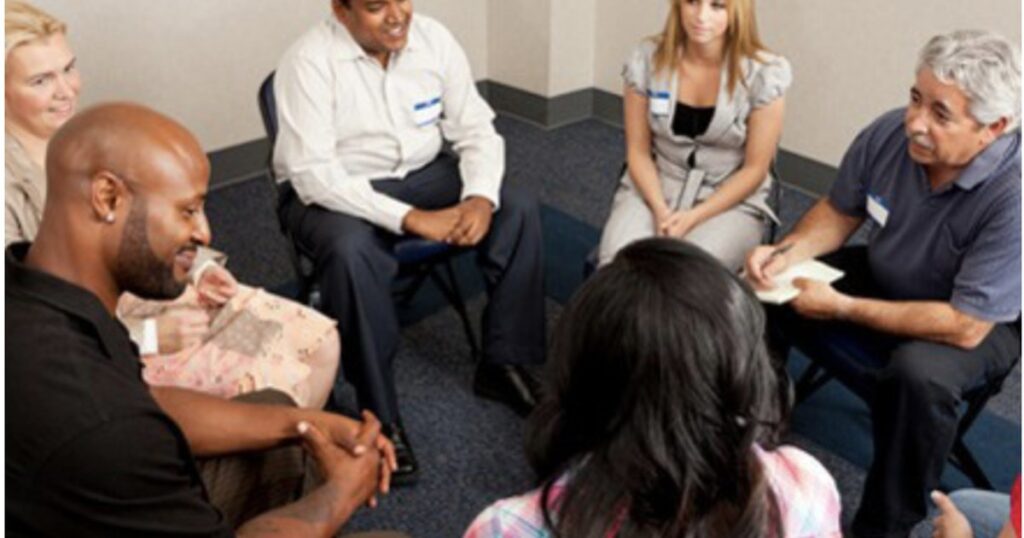 Infidelity support group meeting helping betrayed spouses heal after cheating and betrayal trauma