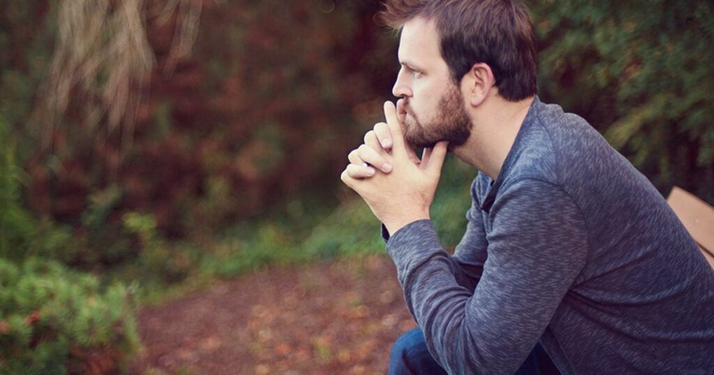 Betrayed husband reflecting emotionally after discovering wife’s affair