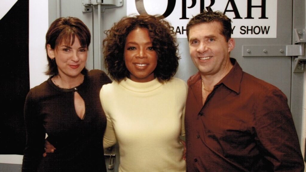 Anne and Brian Bercht with Oprah Winfrey after appearing on The Oprah Winfrey Show in 2005 to discuss healing after infidelity.